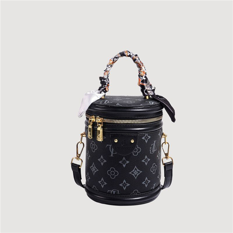 復古印花水桶包包