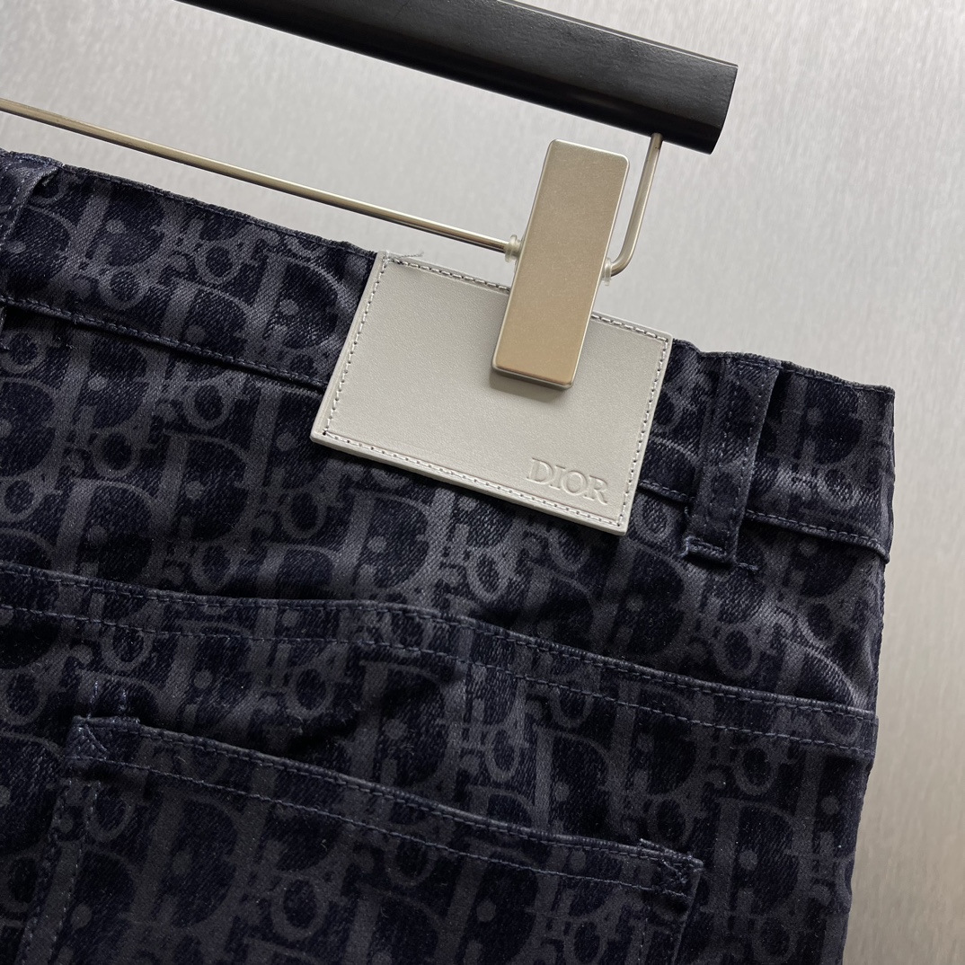 DIOR And Kaws logo print jeans（513D021B321X-C584）