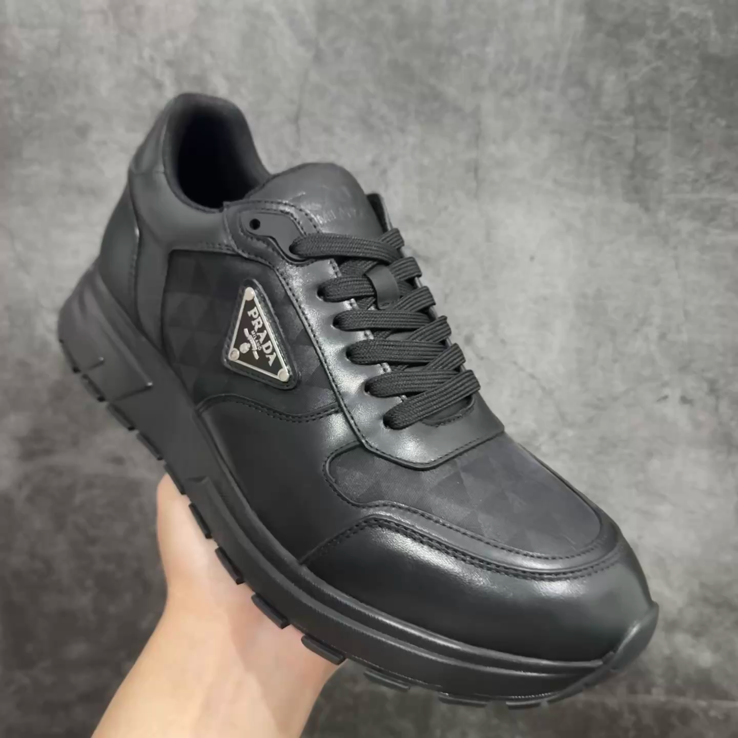 PRADA Leather and nylon high-top sneakers（555088-101）