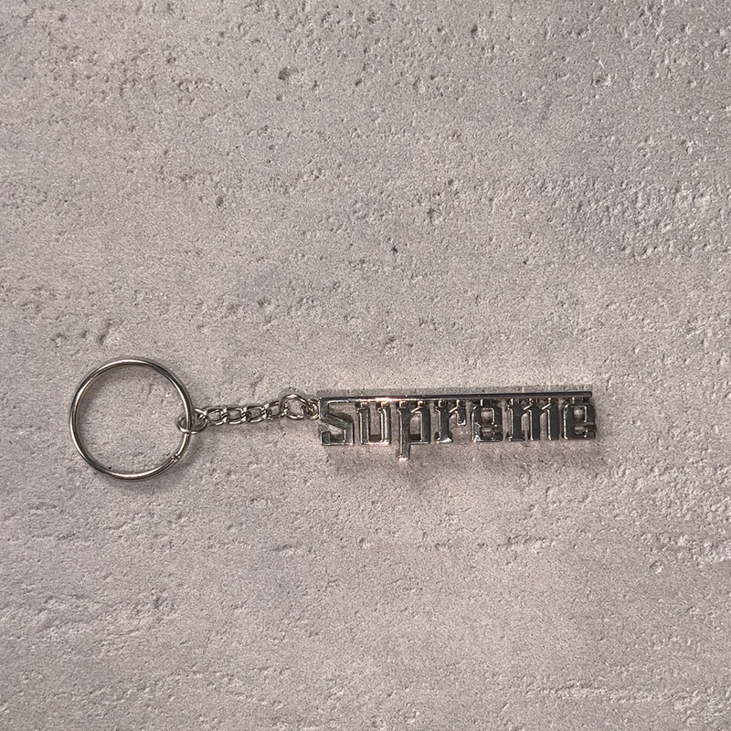 Supreme Grand Prix Keychain (Silver)（SUP-FW24-WEEK3-330）