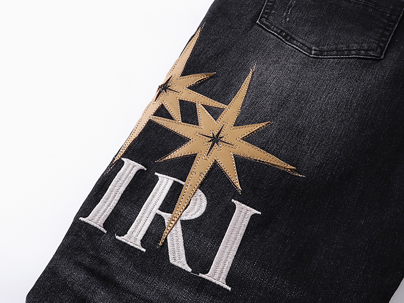 AMIRI Starburst appliqué jeans (AMDNSY1141）