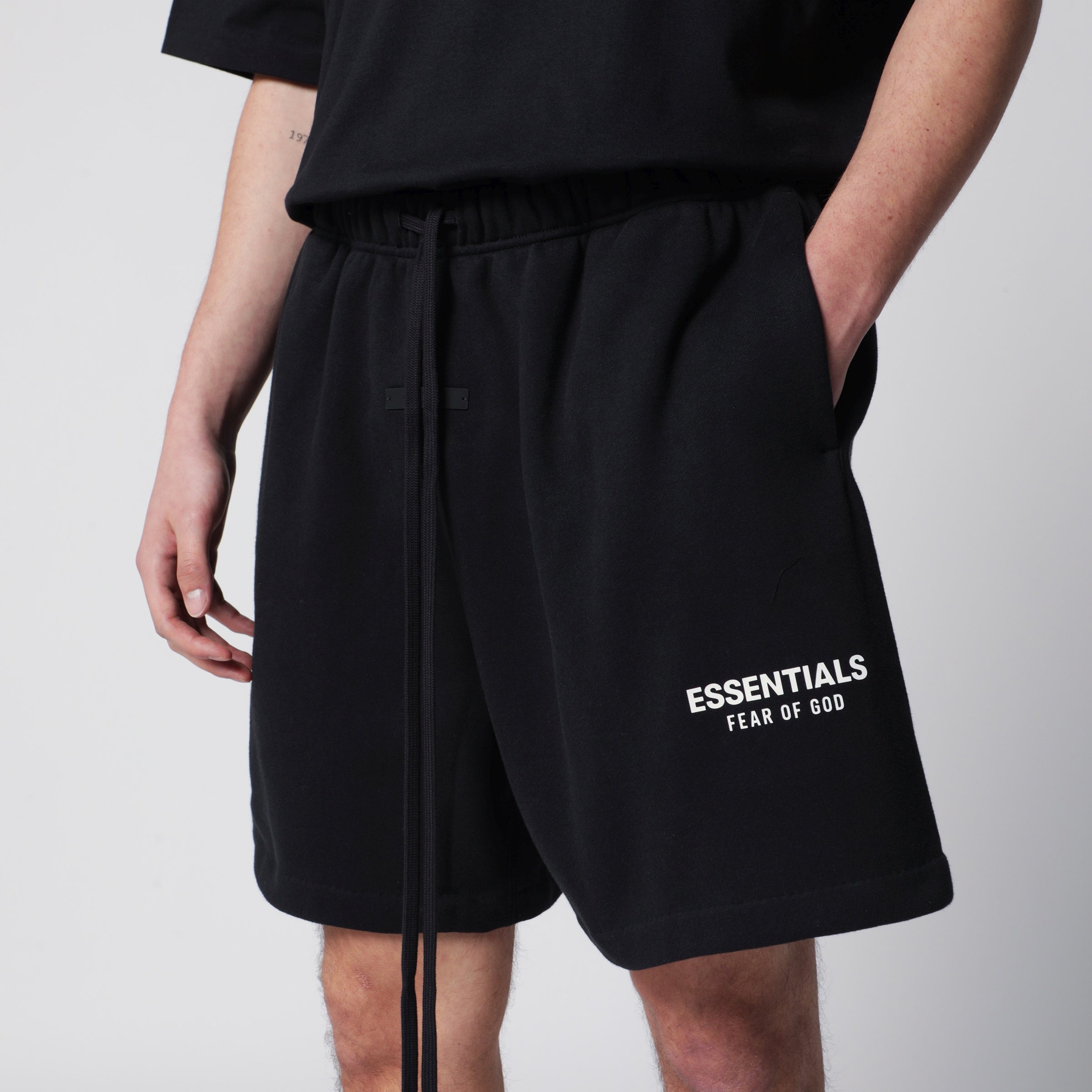 FEAR OF GOD ESSENTIALS Classic black fleece sports shorts ...
