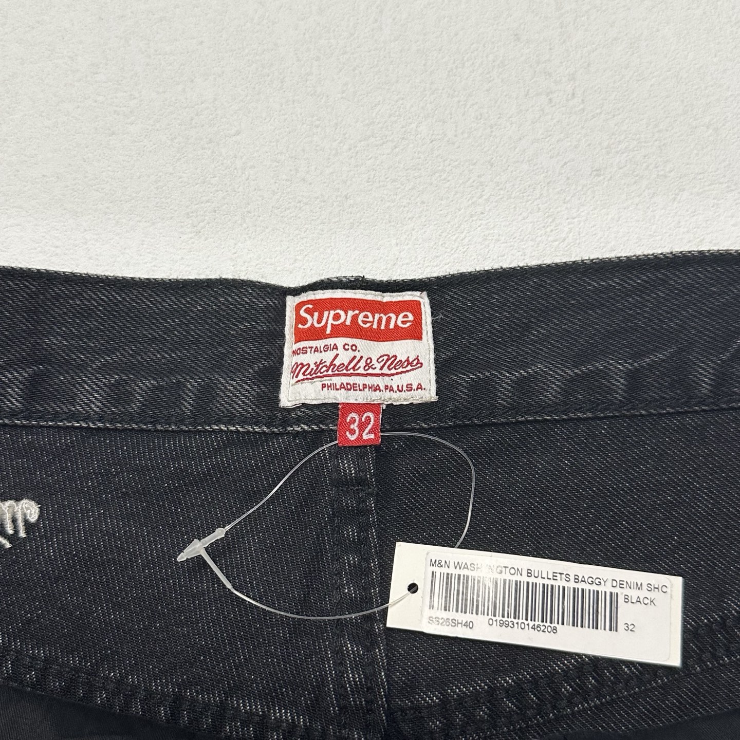 Supreme x Mitchell & Ness Washington Bullets Baggy Denim Short "Washed Black"（SUP-SS26-280）