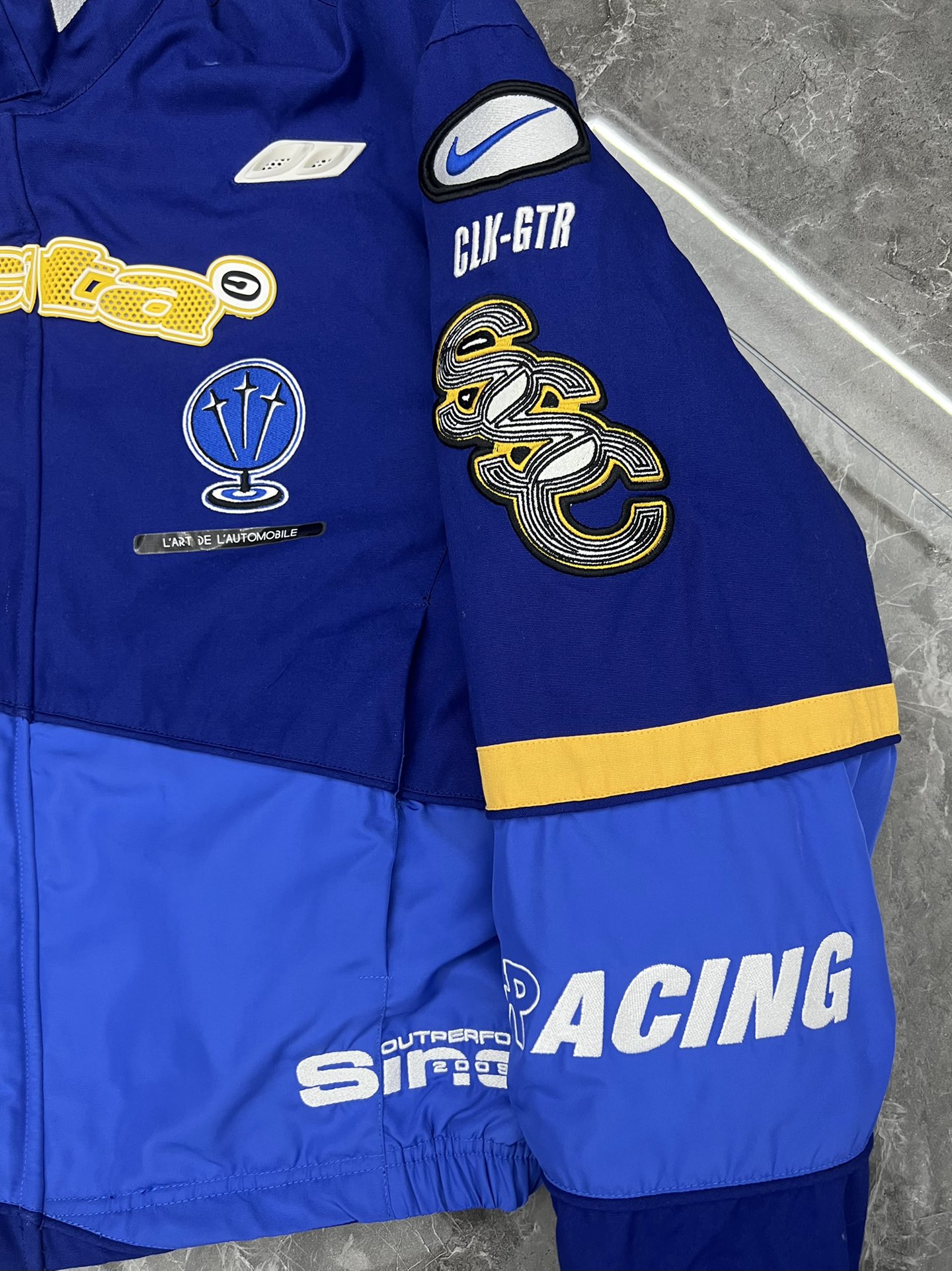 Nike x NOCTA L'Art Racing Jacket (FD2195-455）