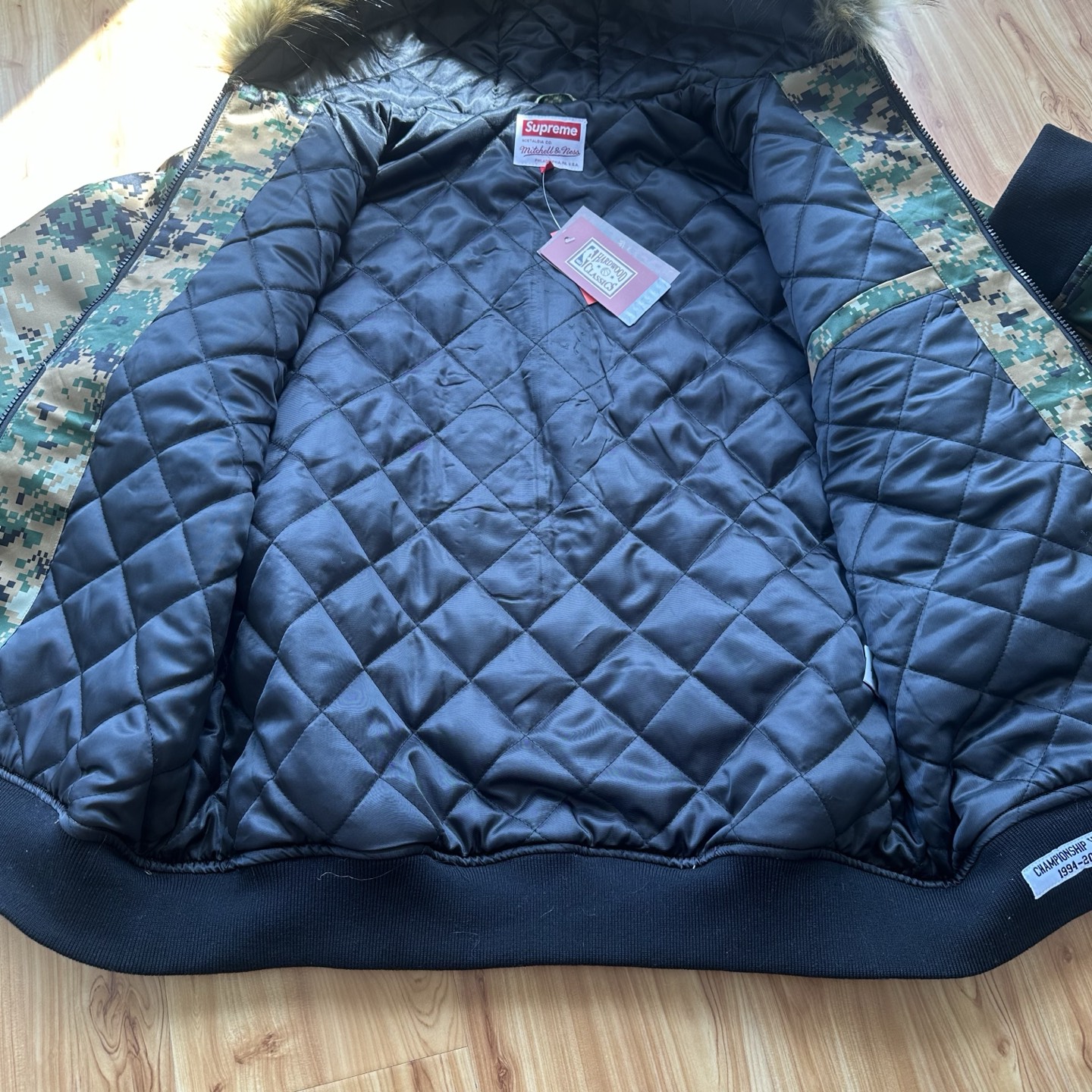 Supreme x Mitchell & Ness Teams Hooded Satin Varsity Jacket "Digi Camo"（SUP-SS26-285）