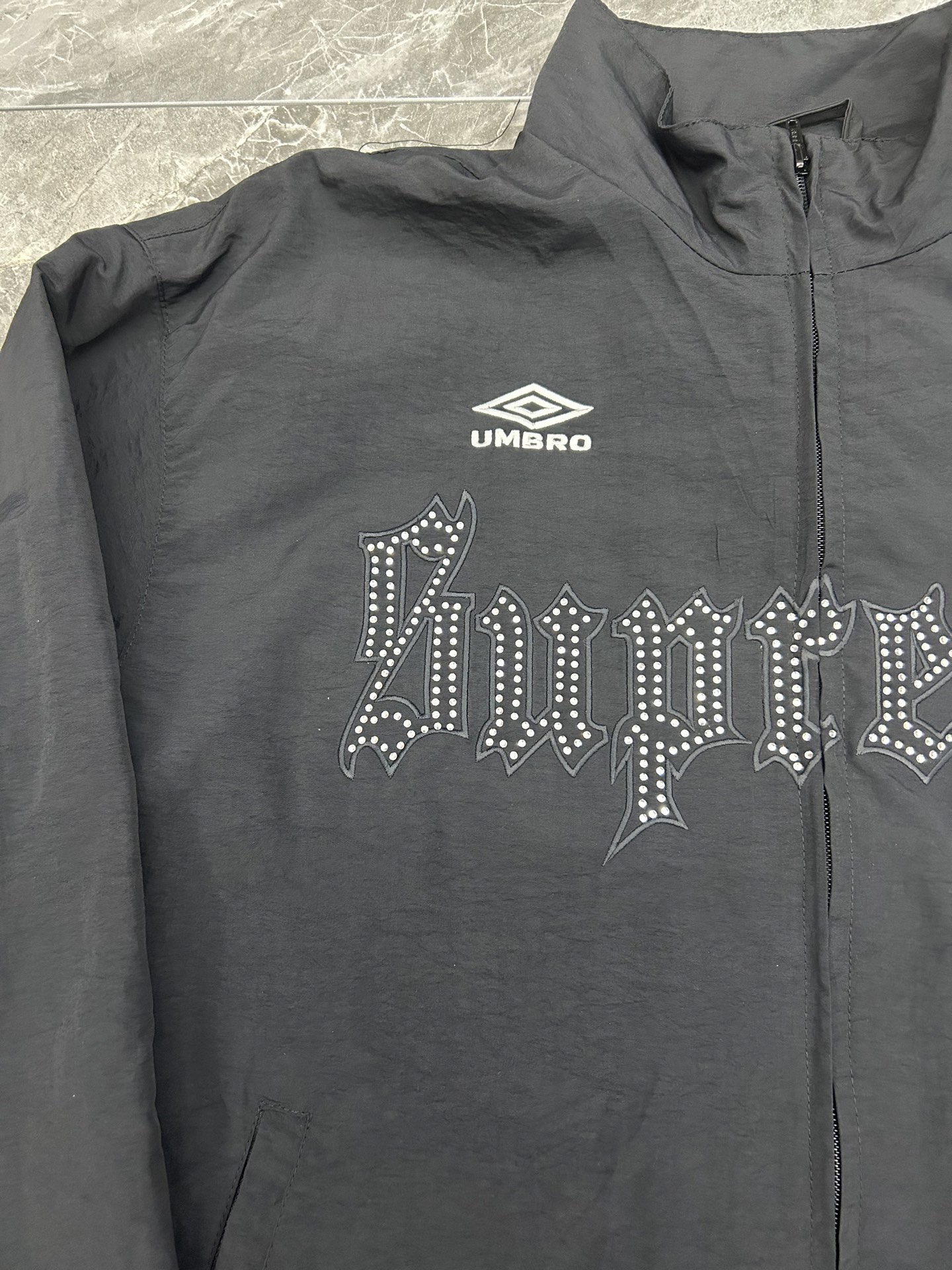 Supreme x Umbro Rhinestone Track Jacket "Black"（SUP-SS26-331）