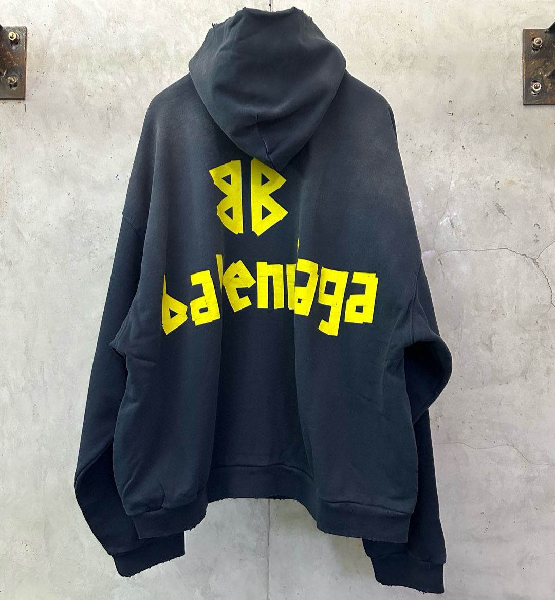 Balenciaga Tape Type Ripped Pocket Hoodie Oversized in black curly fleece(744190TOVB11055）