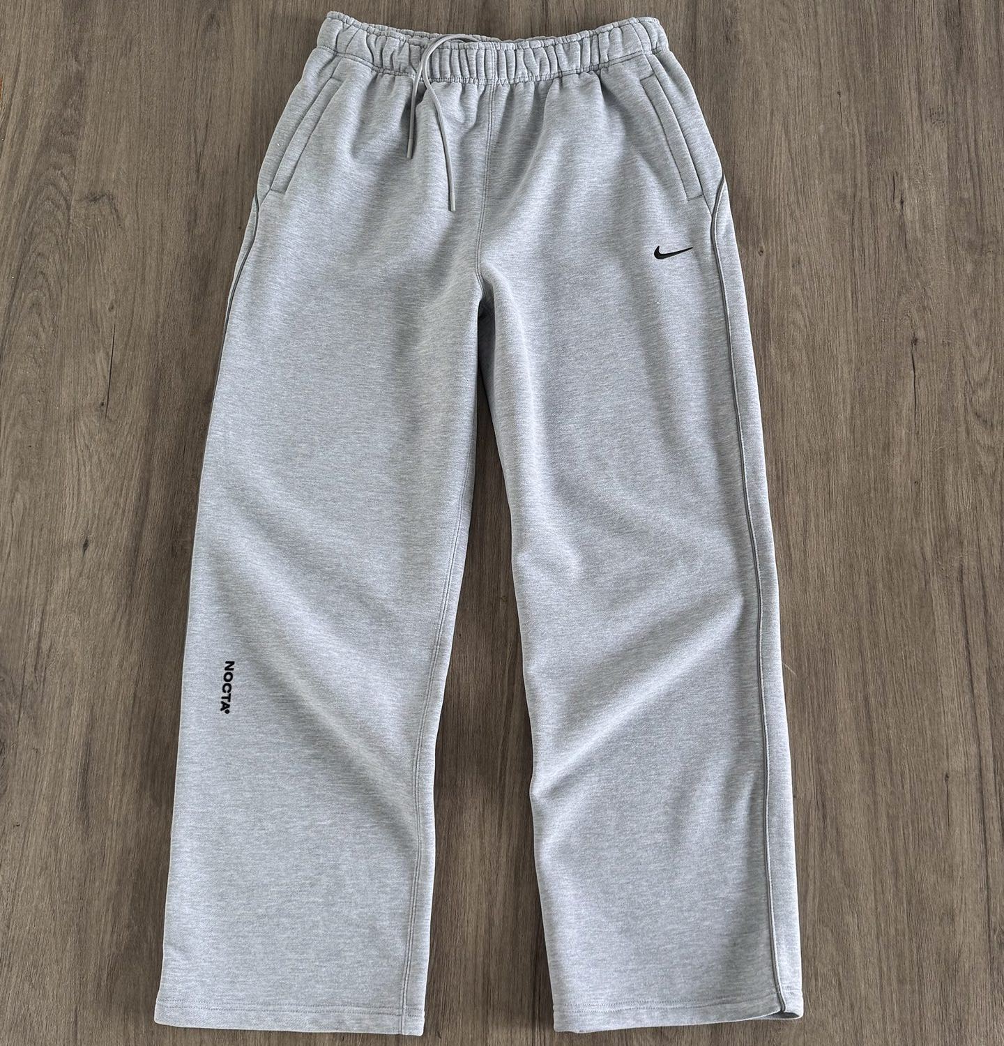 Nike x Drake NOCTA Fleece CS Open Hem Sweatpant (FZ4675-010）
