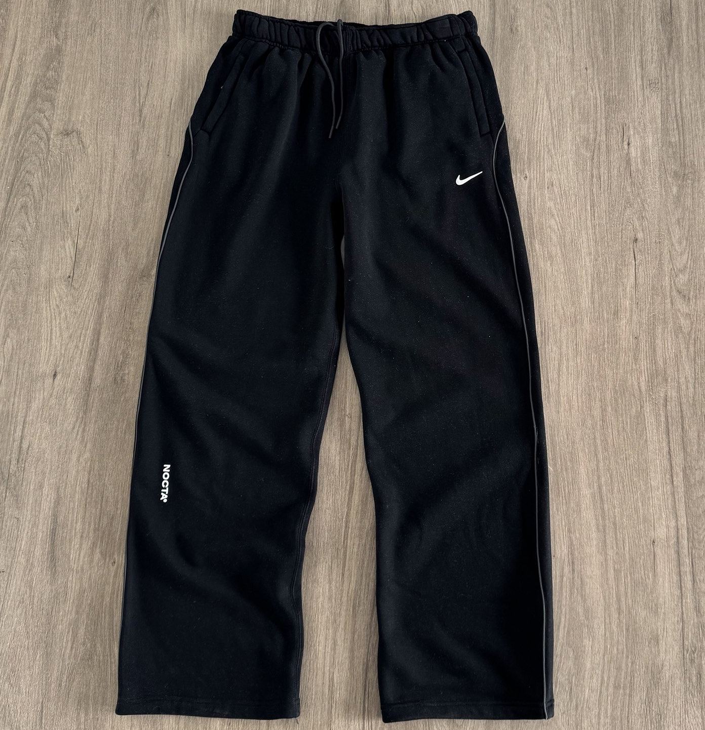 Nike x Drake NOCTA Fleece CS Open Hem Sweatpant (FZ4675-010）