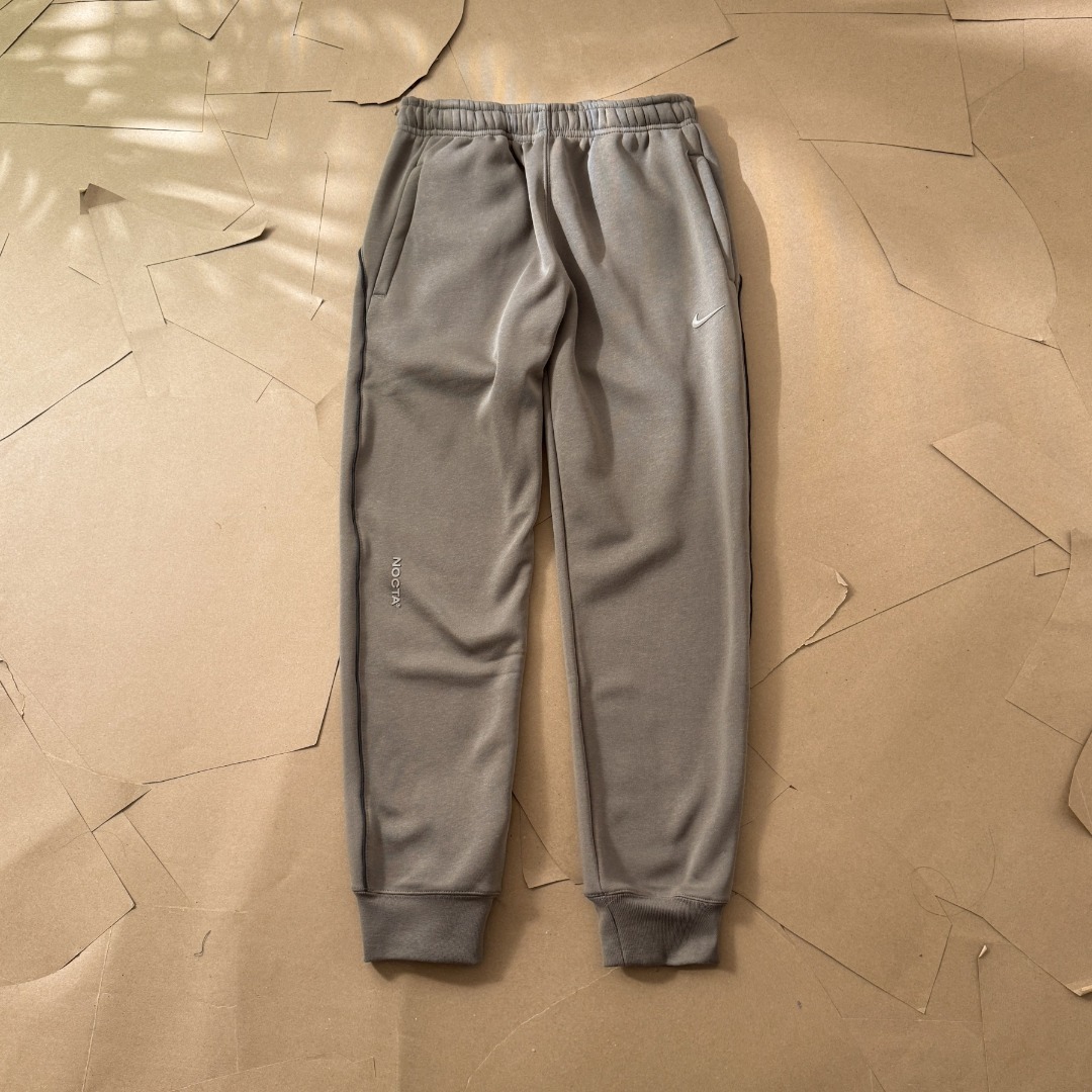 Nike x NOCTA Drake Track Pants with Fleece Lining (FN7661）