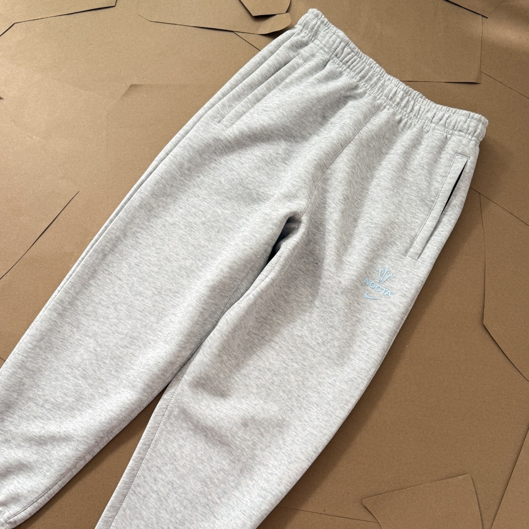 Nike x NOCTA Drake Track Pants with Fleece Lining (DX2840）