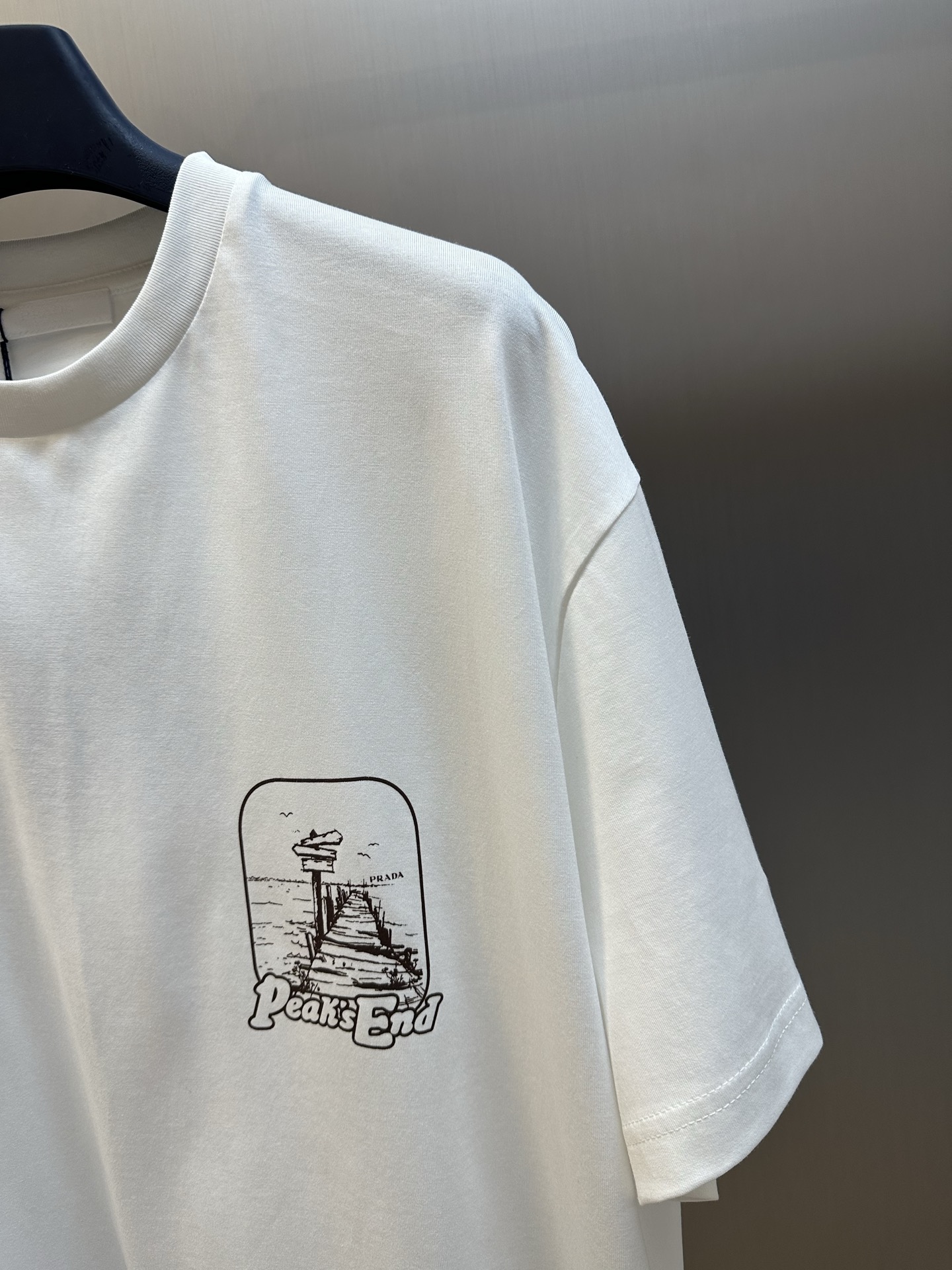 Prada printed cotton T-shirt (UJN972-1851-F0963-S-OOO）