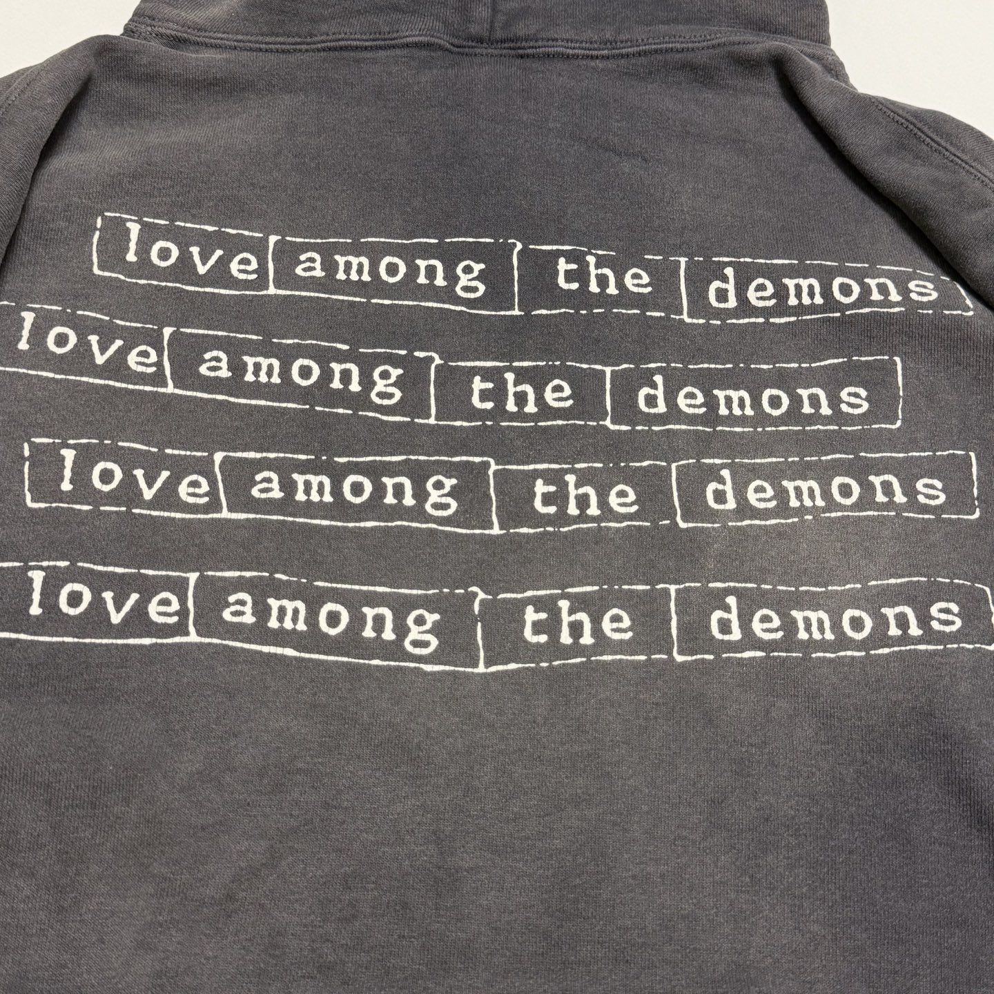 SAINT MXXXXXX HOODIE/LOVE AMONG/BLACK (SM-HR1-0000-053）