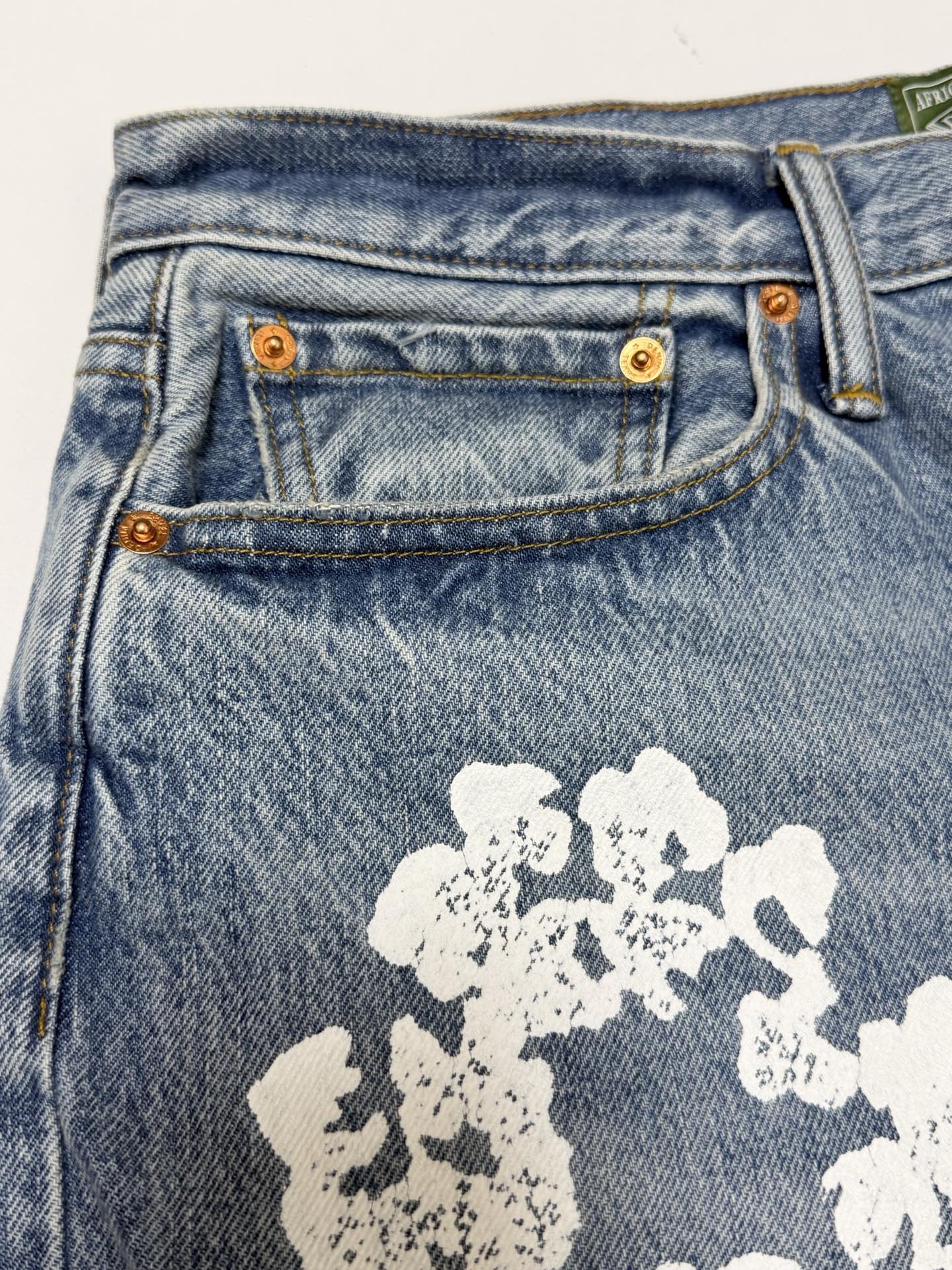 DENIM TEARS / BAGGY COTTON WREATH DENIM PANT（DEN-FW25-003）