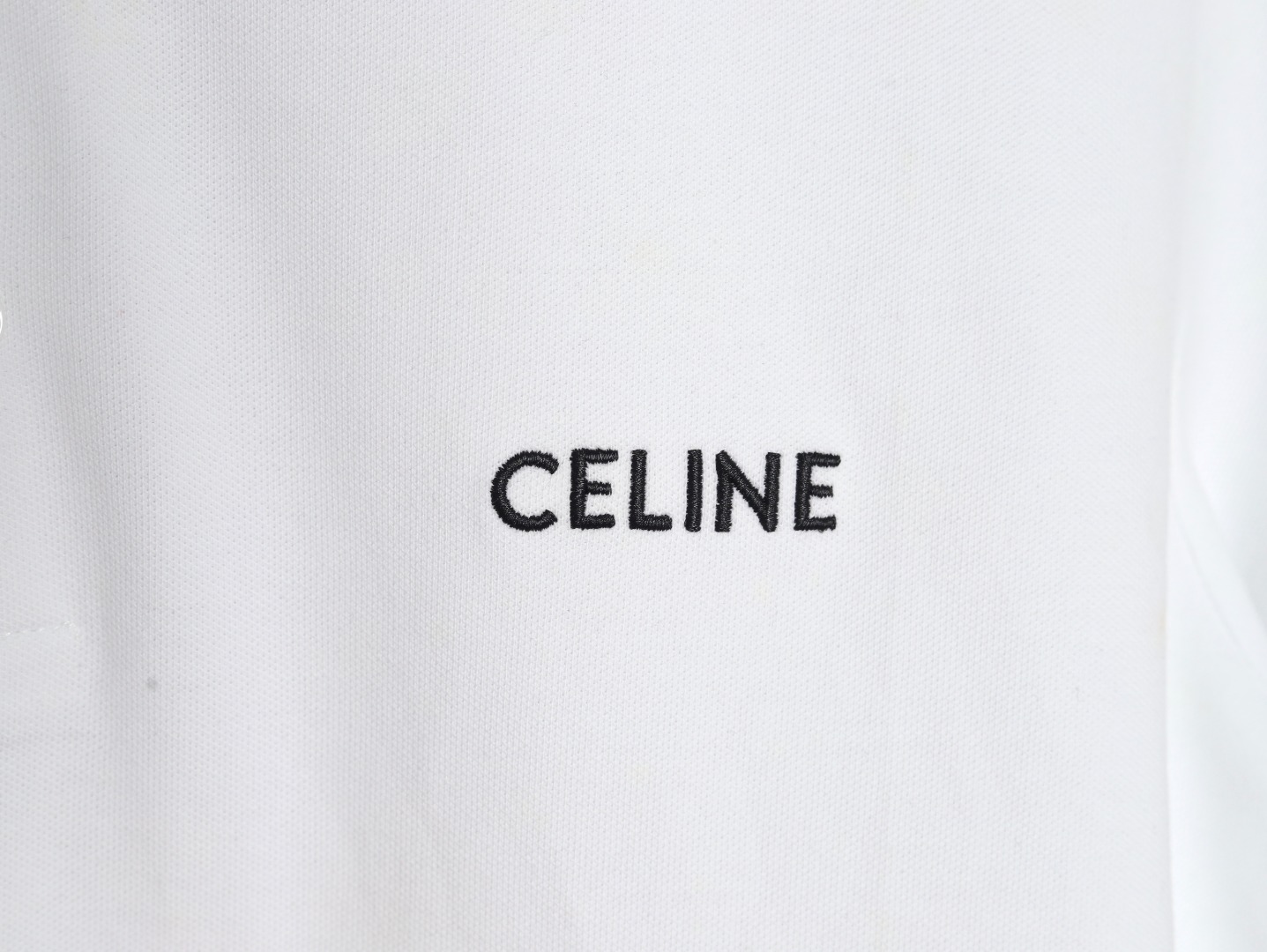 Celine embroidered cotton piqué polo shirt (2X68E043F-01OB）