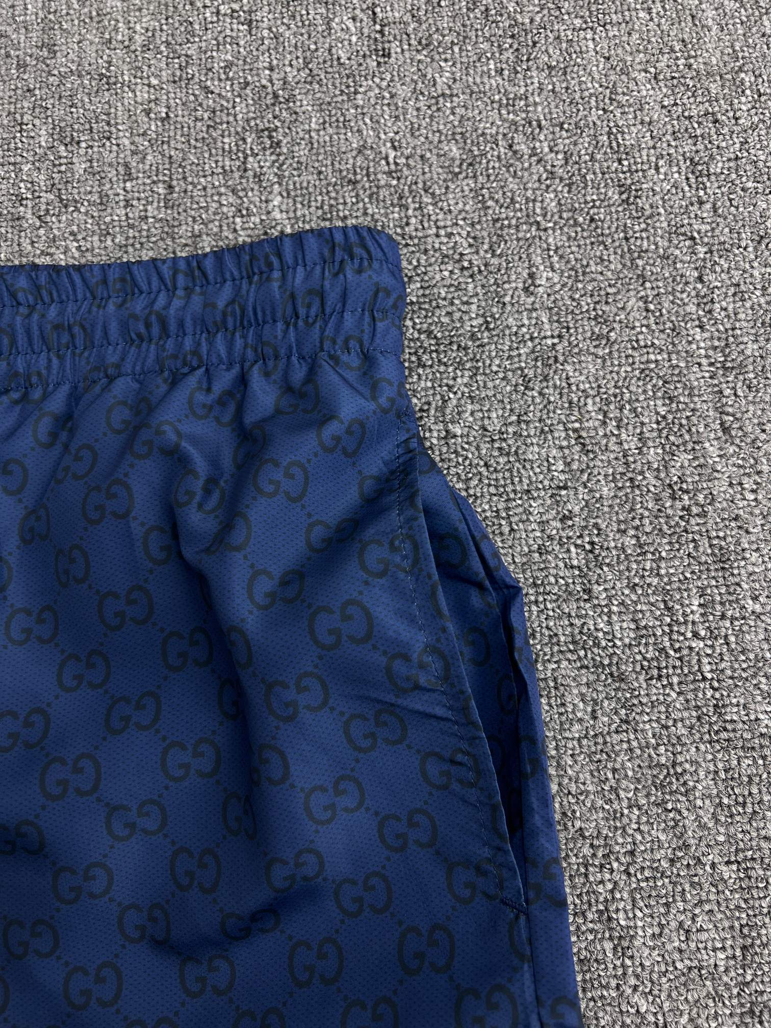 GUCCI Printed technical poplin swim shorts in navy （833310-XHAKR-4139）