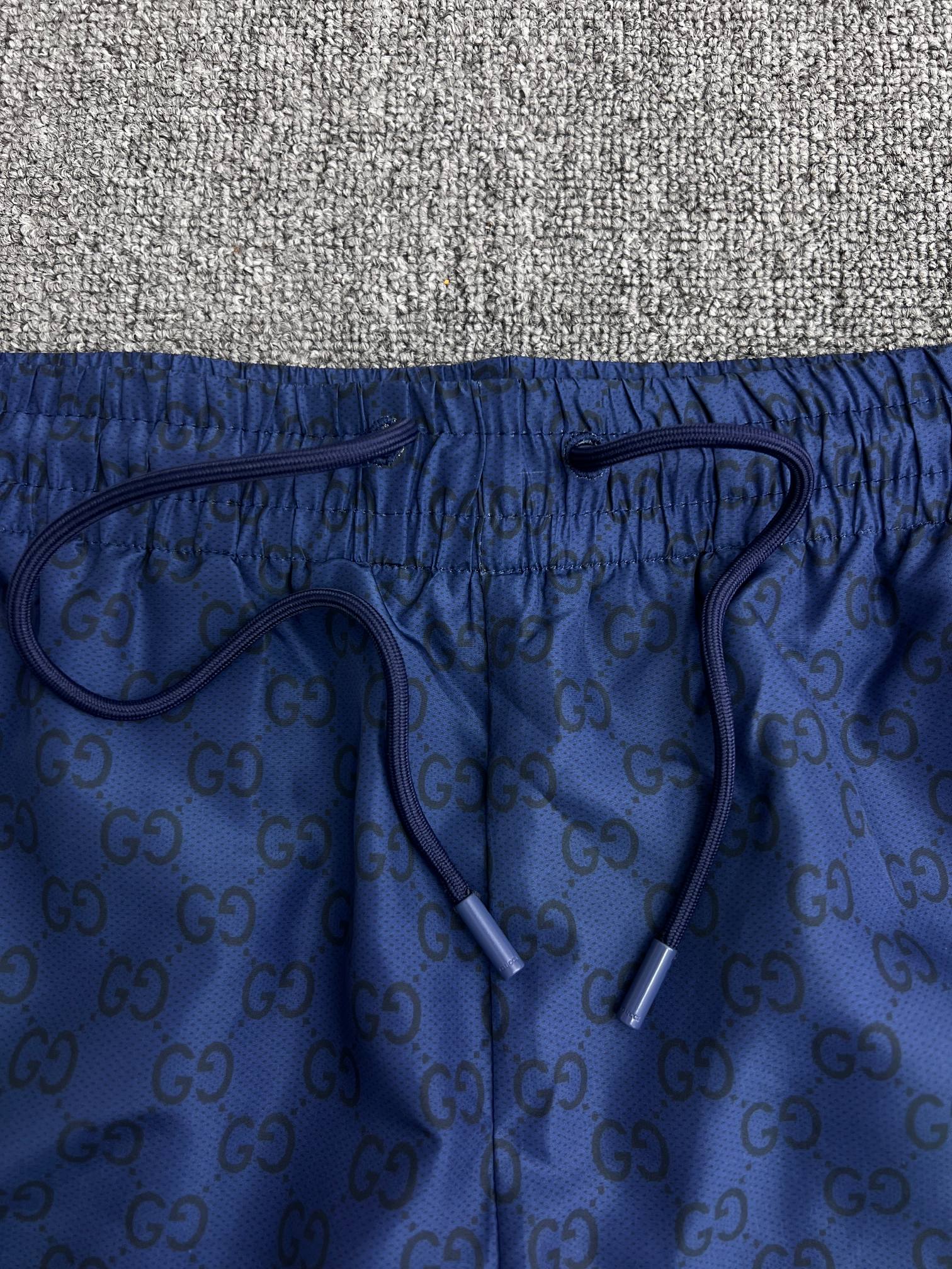 GUCCI Printed technical poplin swim shorts in navy （833310-XHAKR-4139）