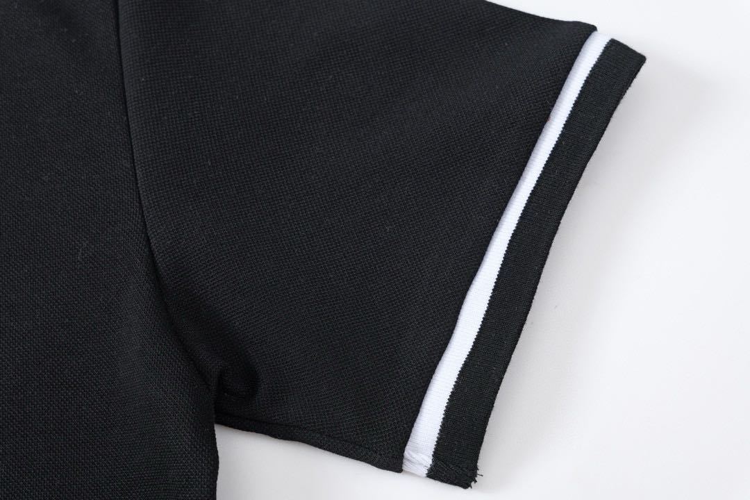 Celine embroidered cotton piqué polo shirt (2X68E043F-01OB）