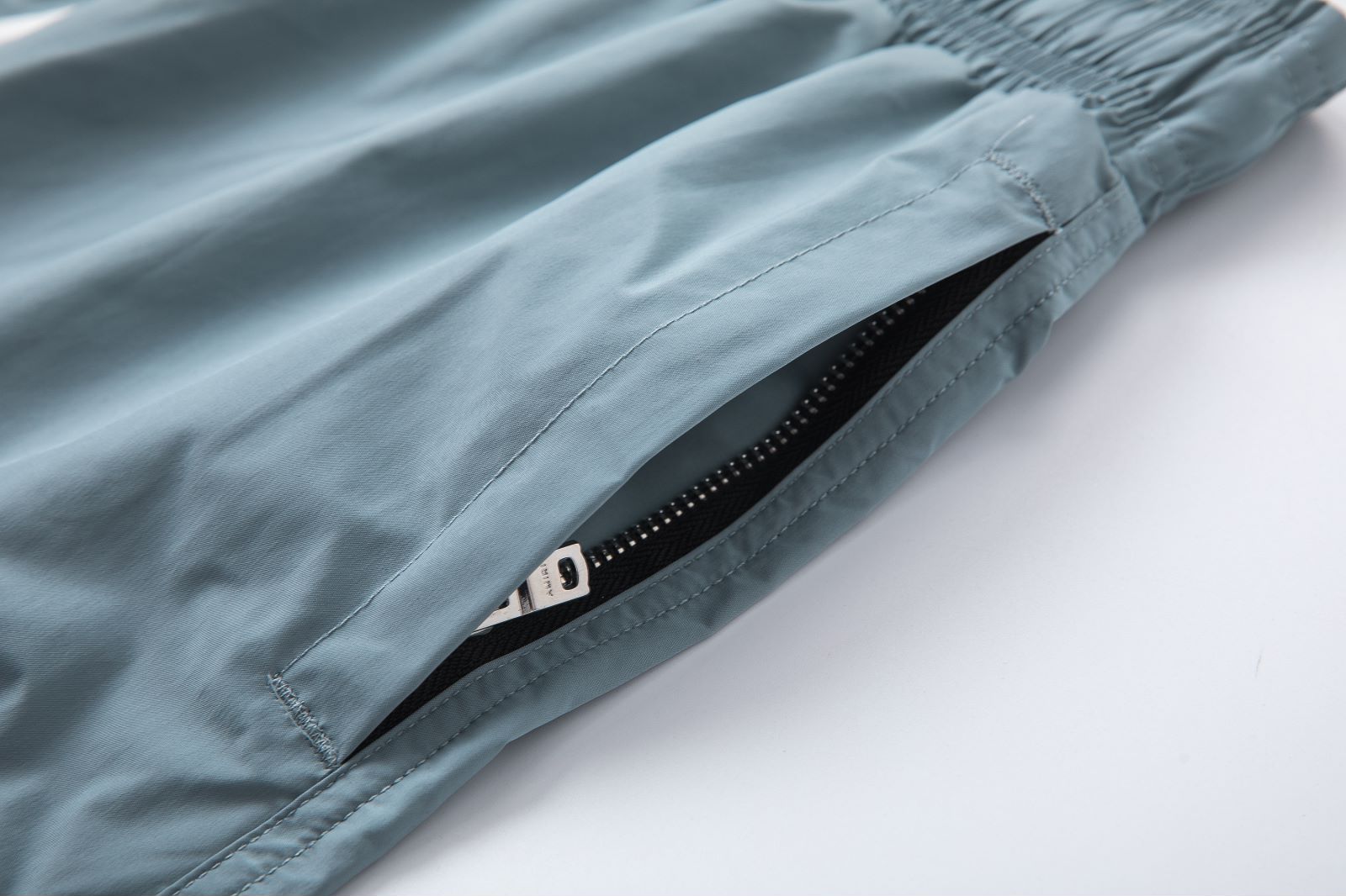 AMIRI CORE LOGO SWIM TRUNKS (PXMJP0029001)
