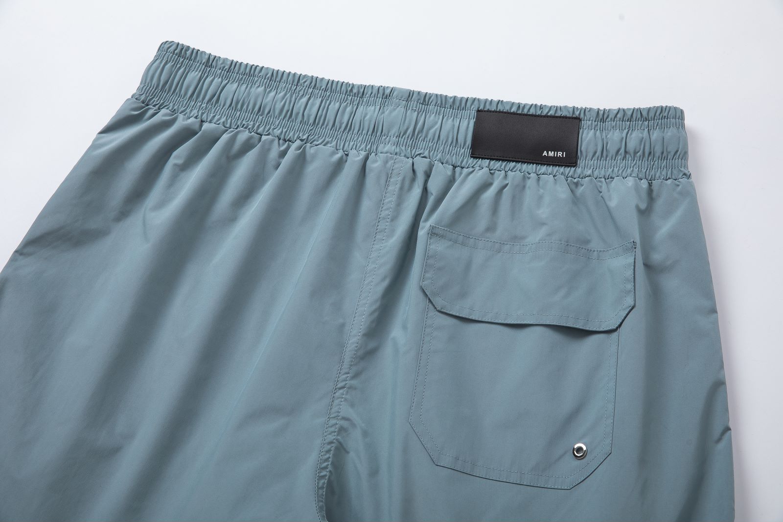AMIRI CORE LOGO SWIM TRUNKS (PXMJP0029001)