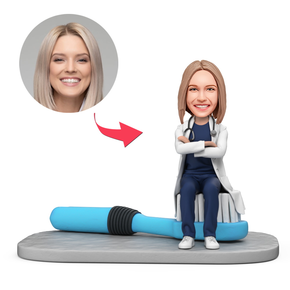 Custom Female Dentist Sitting on Toothbrush With Arms Crossed Custom Bobblehead With Engraved Text Gift