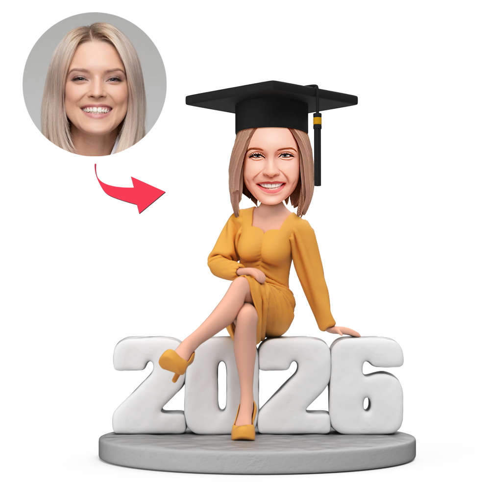 Custom Female Graduate Wearing Graduation Cap and Yellow Dress Sitting on 2026 Custom Bobblehead With Engraved Text Gift