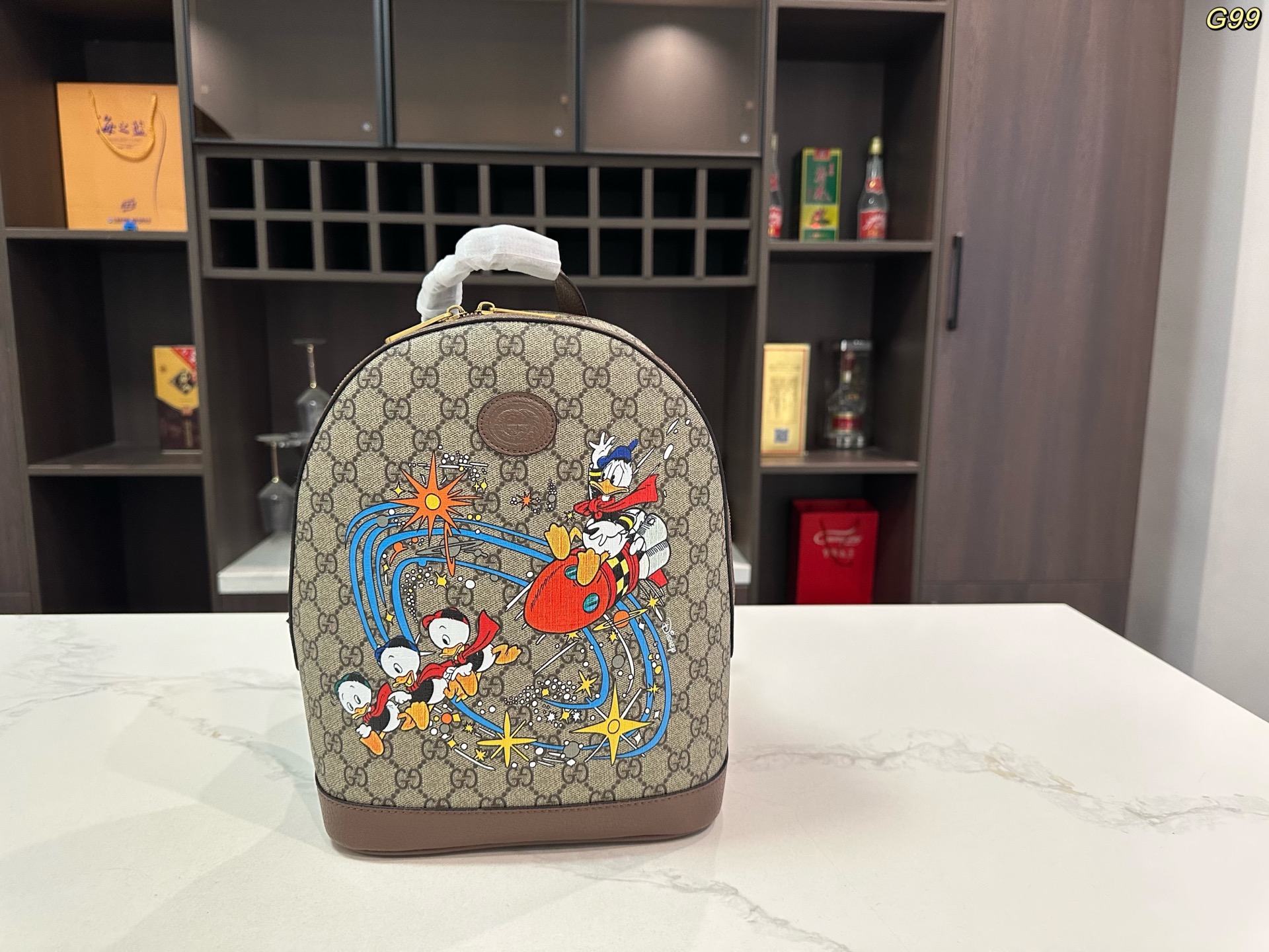 Gucci Disney コラボレーションシリーズ ドナルドダックGGプリントバックパック 30*22cm ユニセックス リュックサック