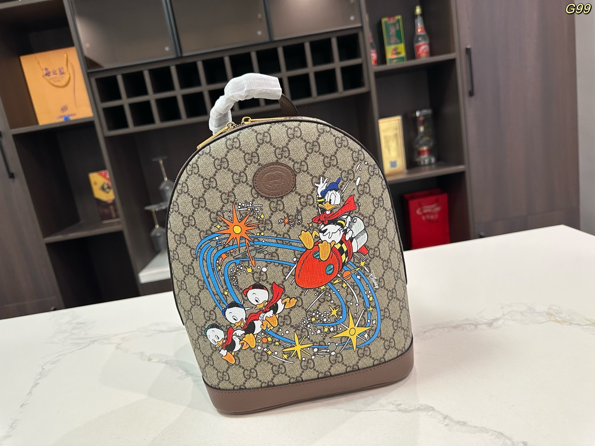 Gucci Disney コラボレーションシリーズ ドナルドダックGGプリントバックパック 30*22cm ユニセックス リュックサック