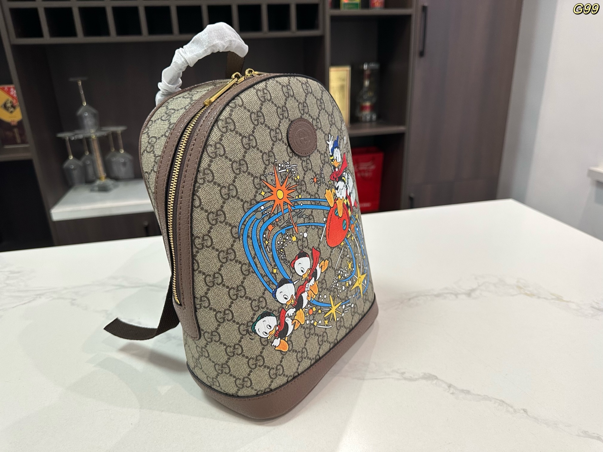Gucci Disney コラボレーションシリーズ ドナルドダックGGプリントバックパック 30*22cm ユニセックス リュックサック