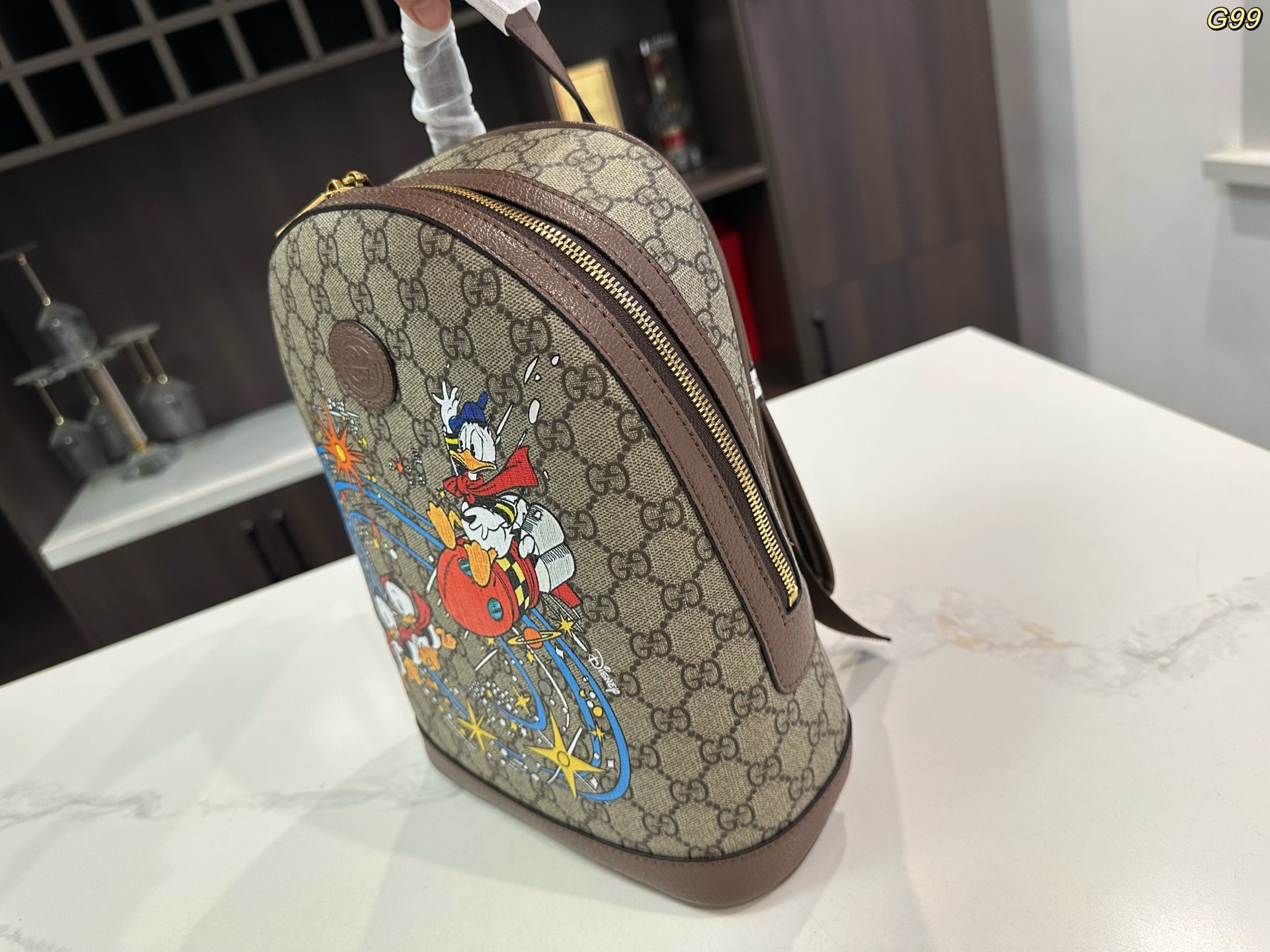 Gucci Disney コラボレーションシリーズ ドナルドダックGGプリントバックパック 30*22cm ユニセックス リュックサック