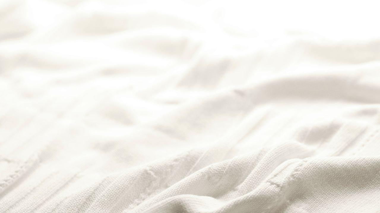 A knitted blanket made from organic cotton 