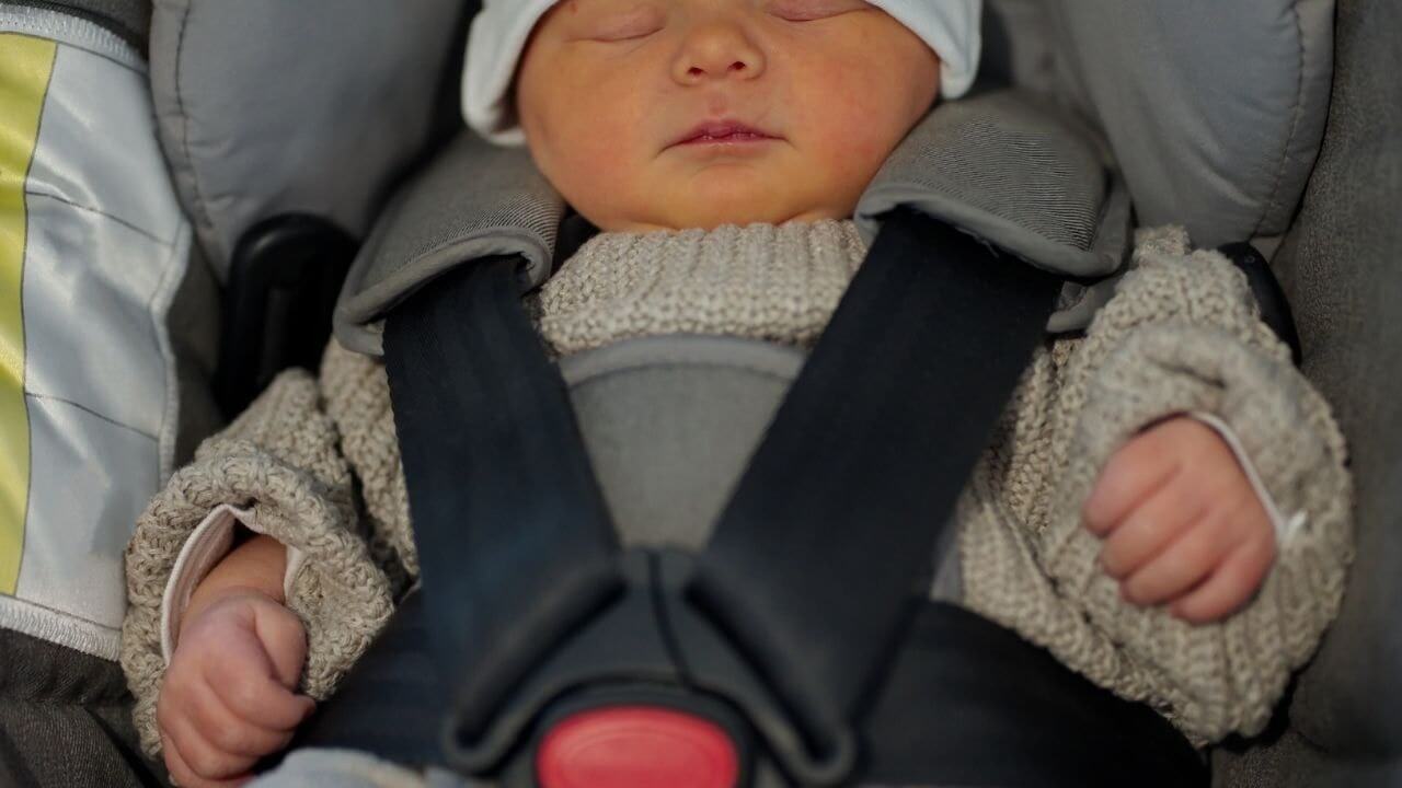  Infant sleeping in a Car Seat 