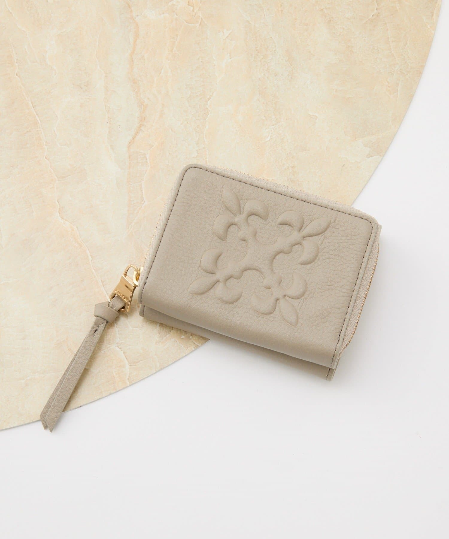 *4-6 Weeks* (85843) 2026 Russet Embossed Monogram Tri-fold Wallet