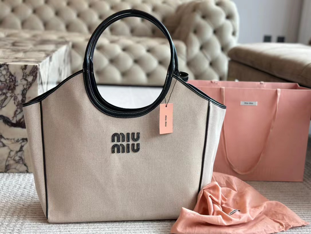 M1UM1U シンプルハンドバッグ 34×25cm【50％割引+送料無料】