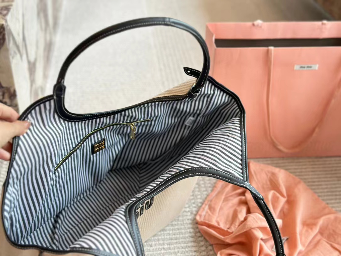 M1UM1U シンプルハンドバッグ 34×25cm【50％割引+送料無料】