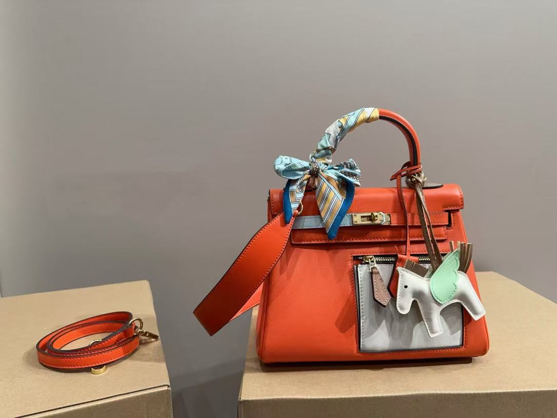 HERME5 kellyオレンジ色のハンドバッグ【50％割引+送料無料】