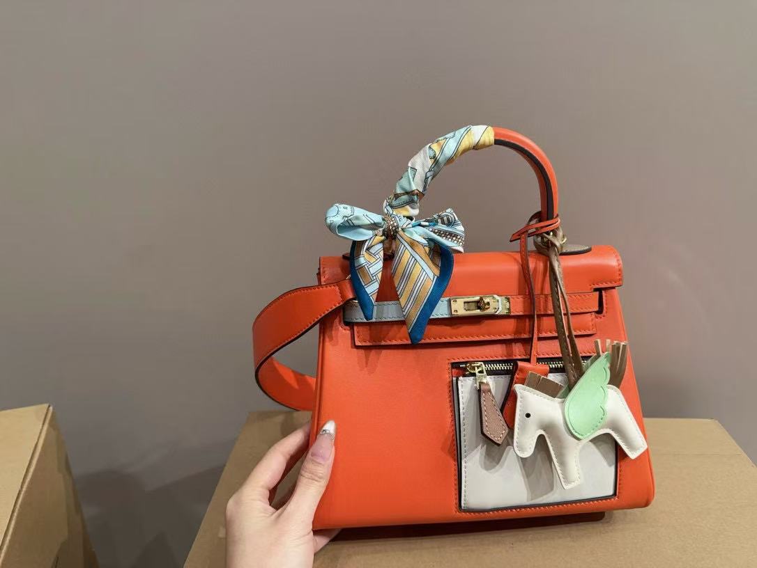 HERME5 kellyオレンジ色のハンドバッグ【50%割引+送料無料】