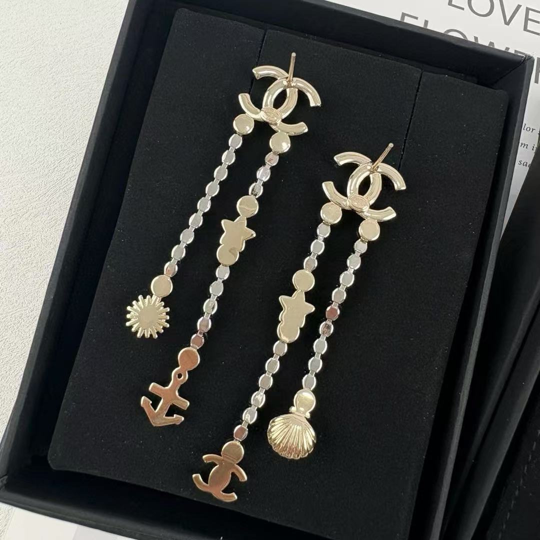 CHANE1 シェルタッセルピアス【50％割引+送料無料】
