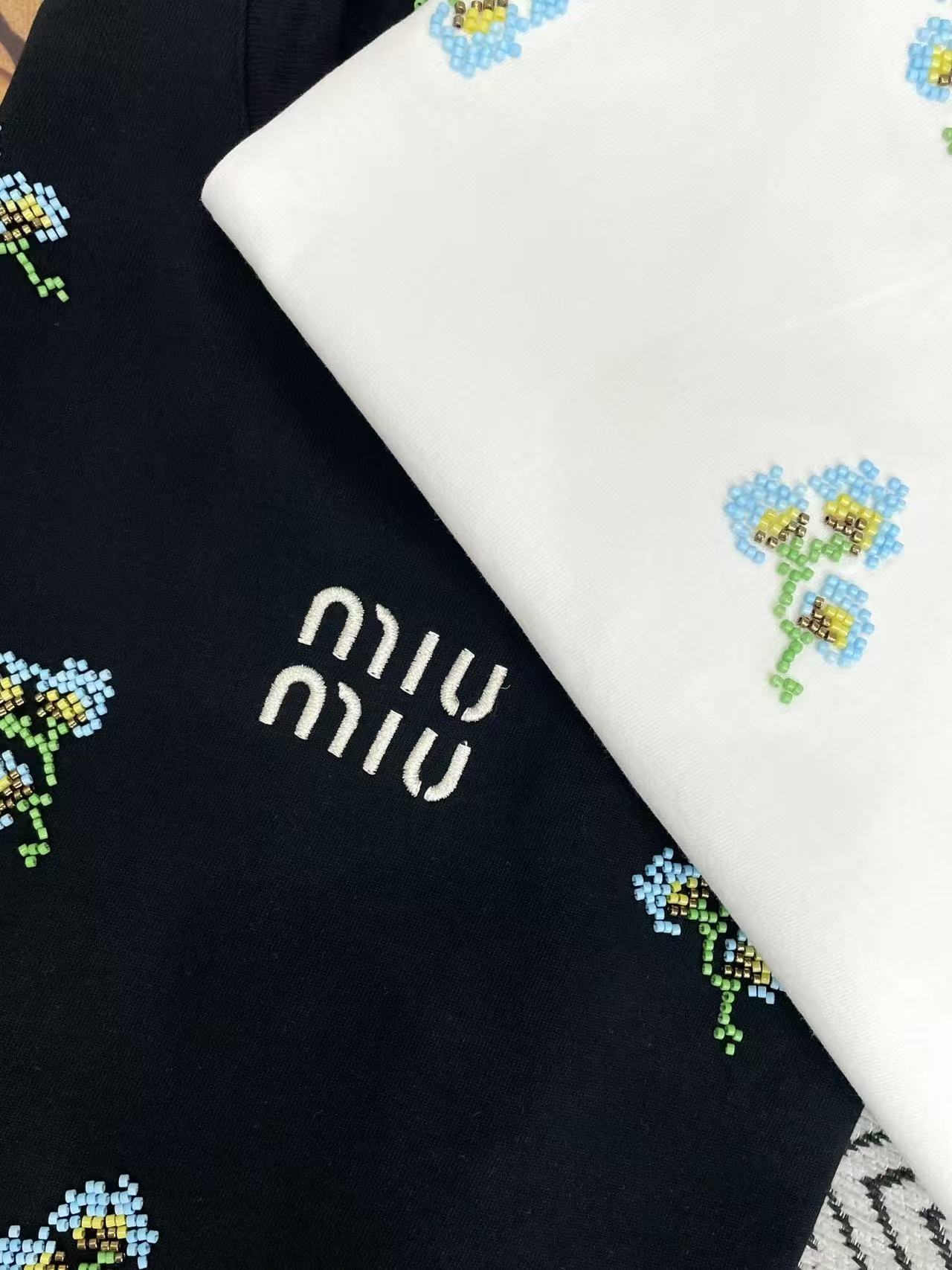 M1UM1U プリントTシャツ【50％割引+送料無料】