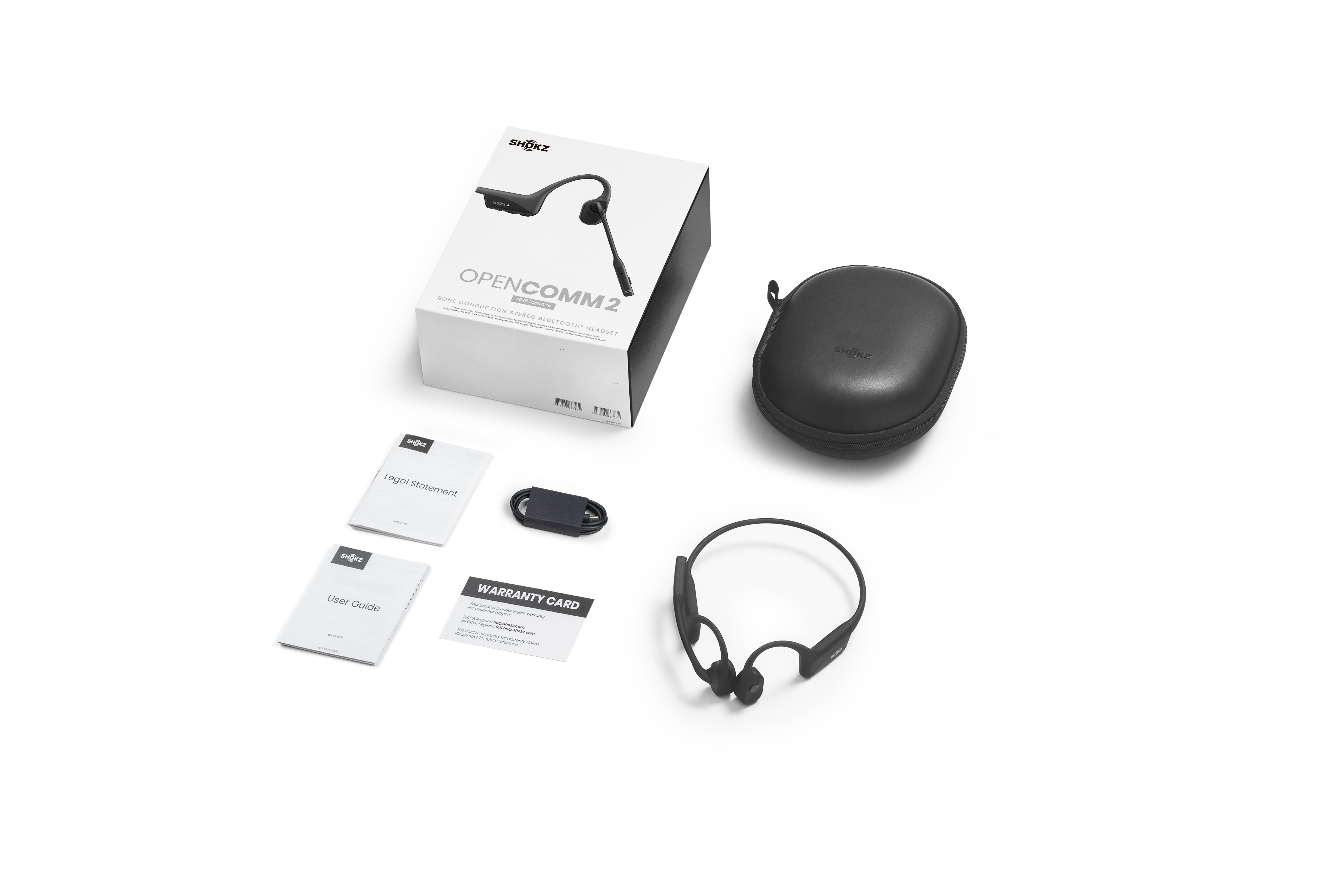 What's In The Box
      
        
          OpenComm2 2025 Upgrade Headset
          USB-C Charging Cable
          Hard Shell Carrying Case
          Manual *1
          Legal Statement *1
          Warranty Card *1
        
      

      
        
          *If you experience any redness of the skin, swelling, or itchiness while wearing the product, discontinue use of the product immediately and consult a physician.