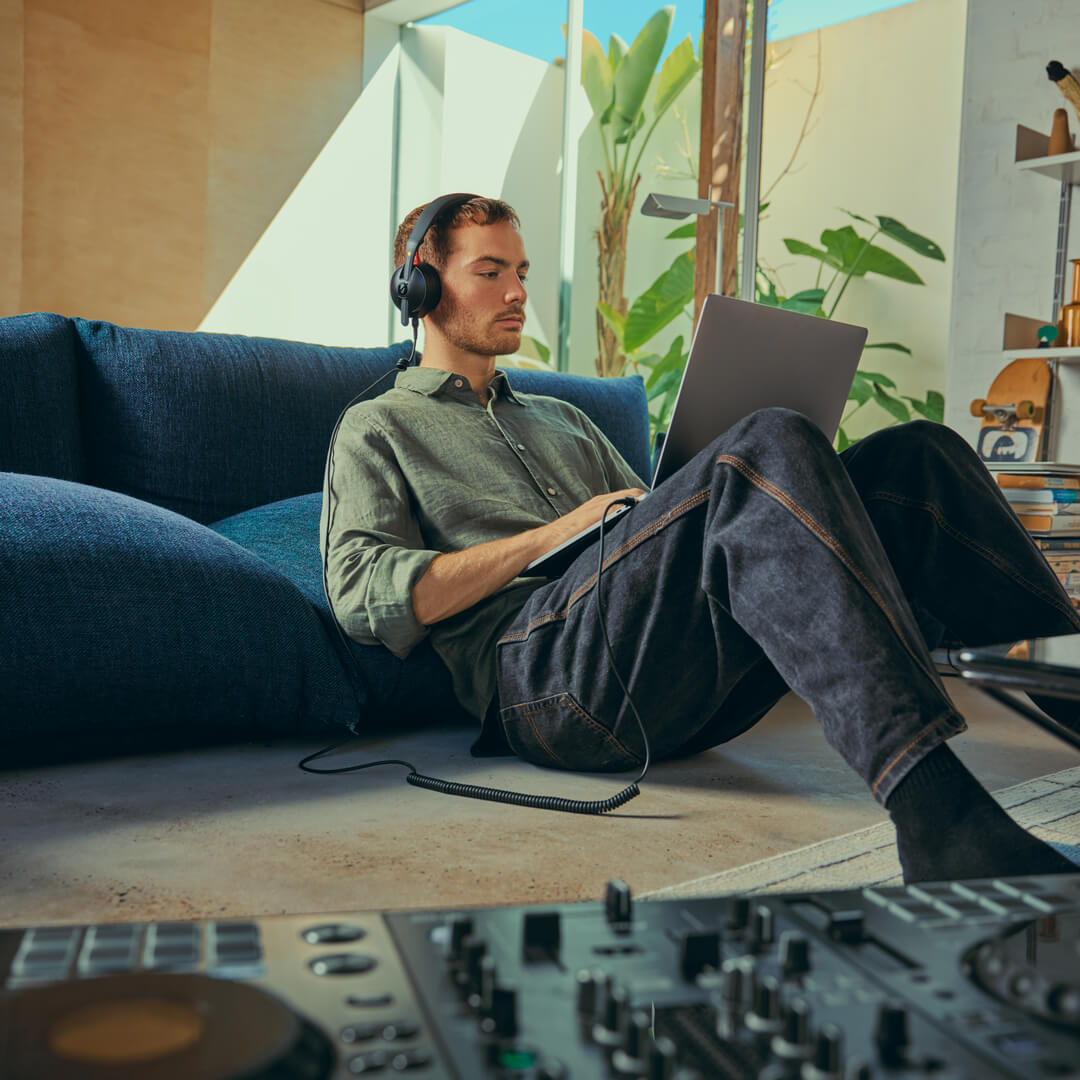 Man on laptop with NTH-50 plugged in