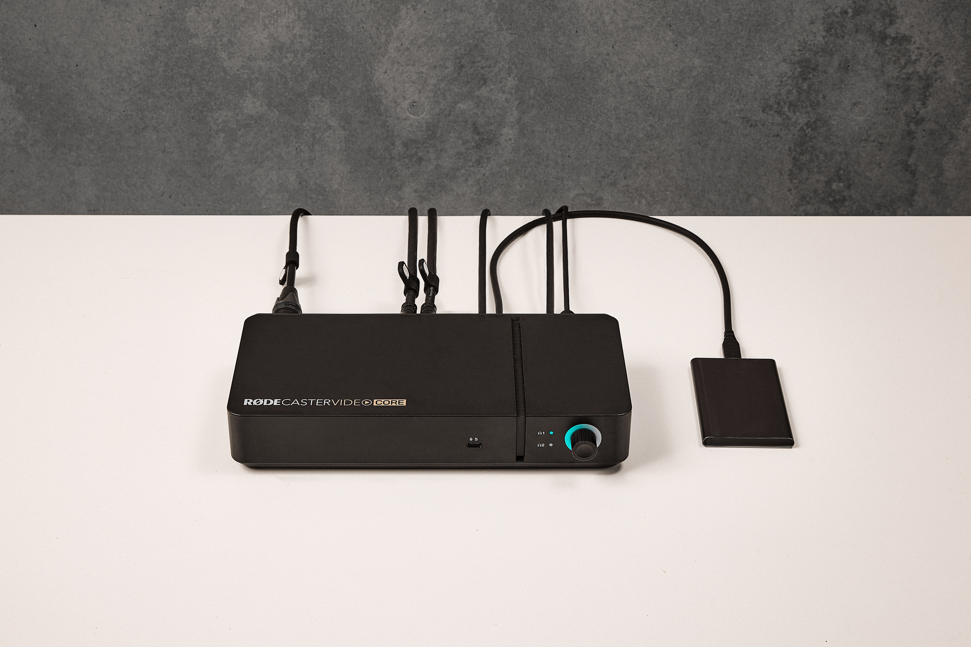 Person using RØDECaster Video desk setup for streaming