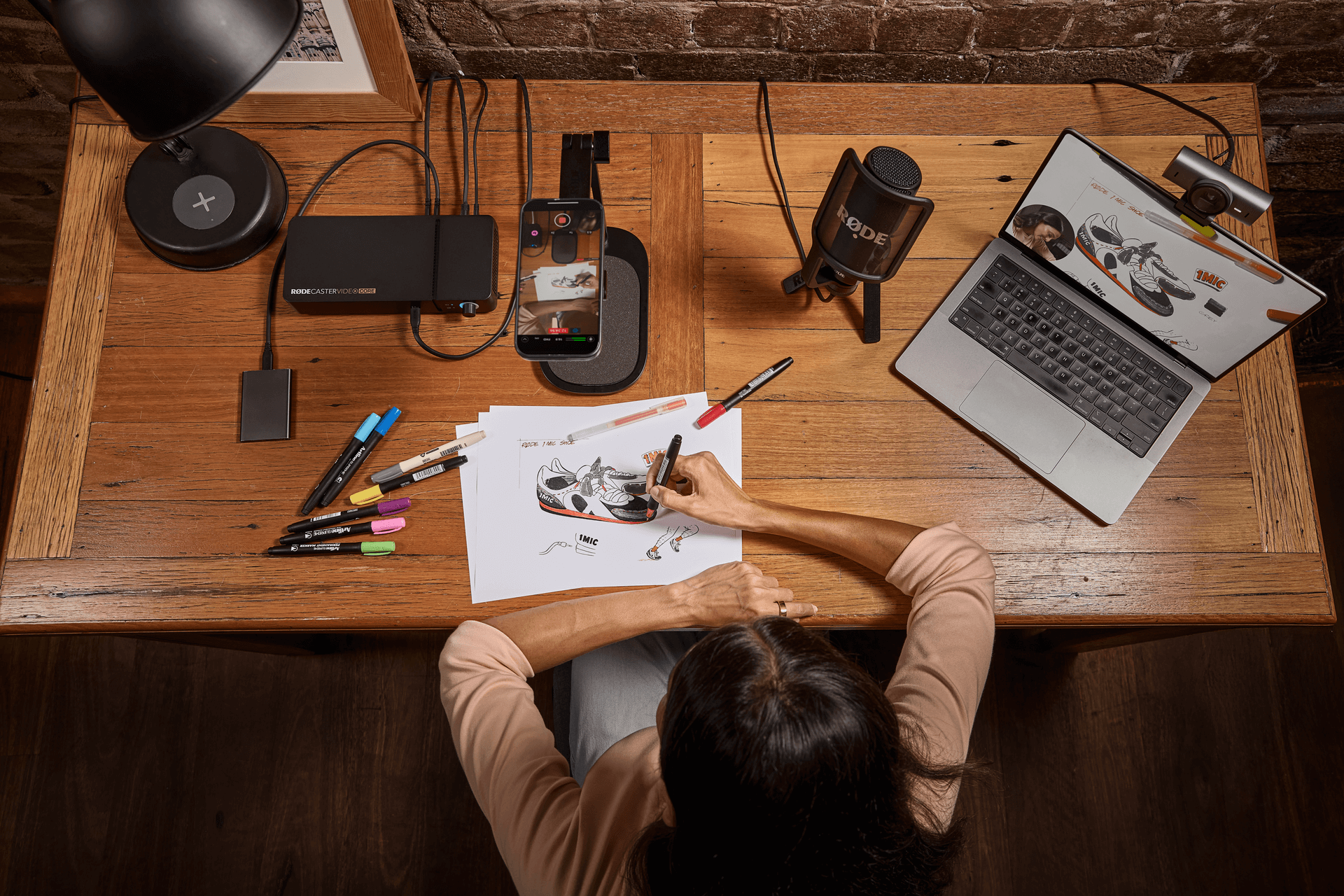 RØDECaster Video and hard drive on wooden table