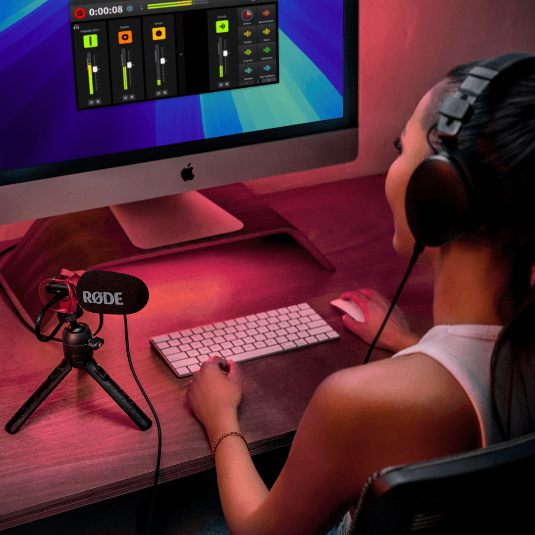 Girl with computer setup using VideoMic GO II