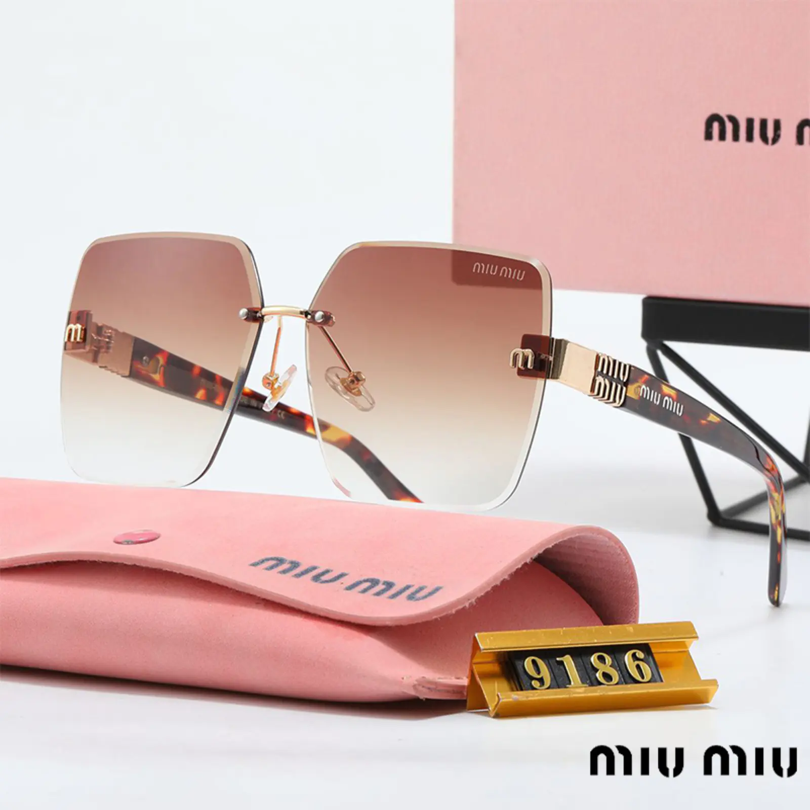 MIUMIUUVカットサングラス06 SS94245