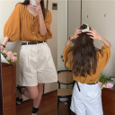薑黃色