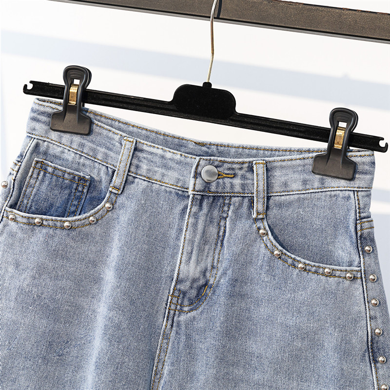 新款高腰破洞釘珠毛邊牛仔短褲