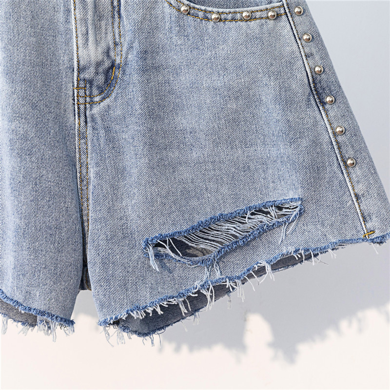 新款高腰破洞釘珠毛邊牛仔短褲
