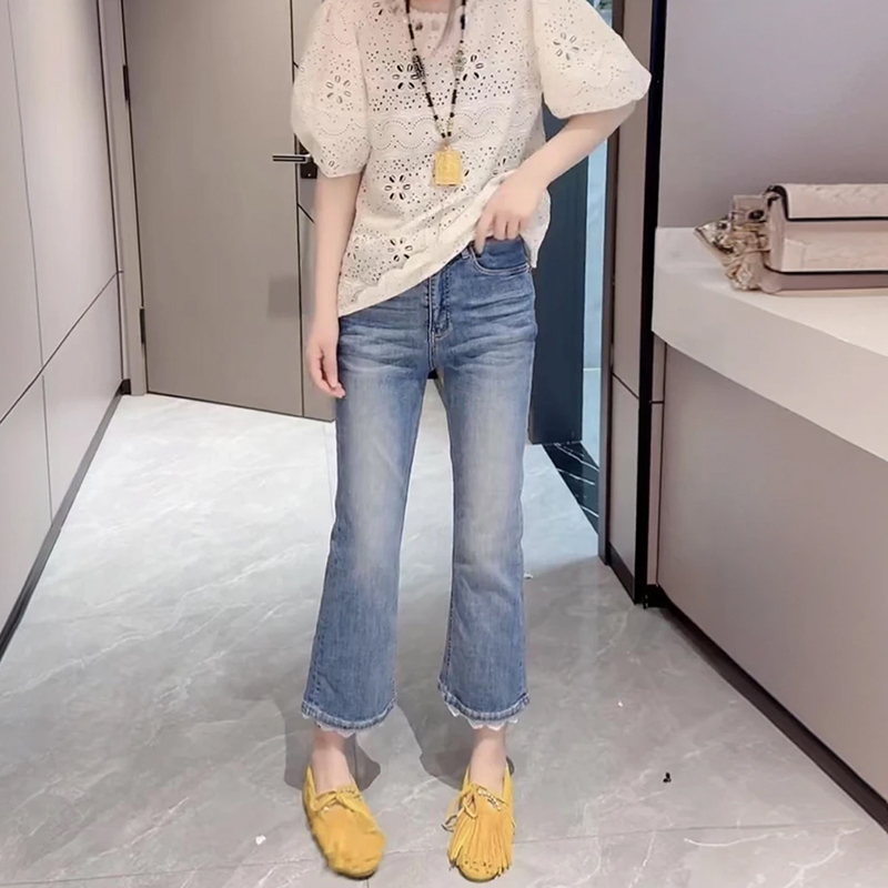 拼接蕾絲九分微喇叭牛仔褲