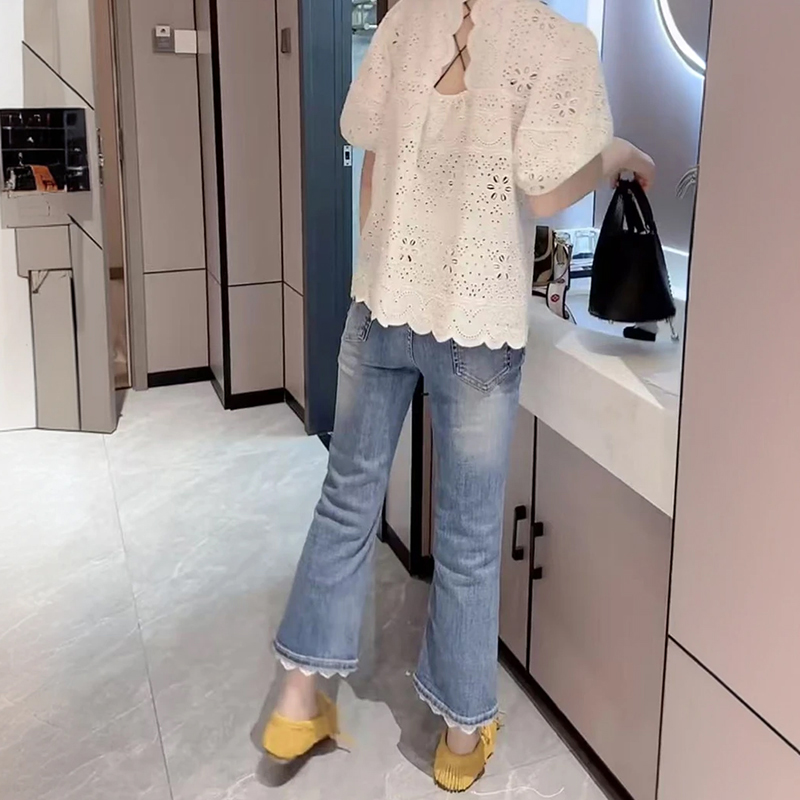 拼接蕾絲九分微喇叭牛仔褲